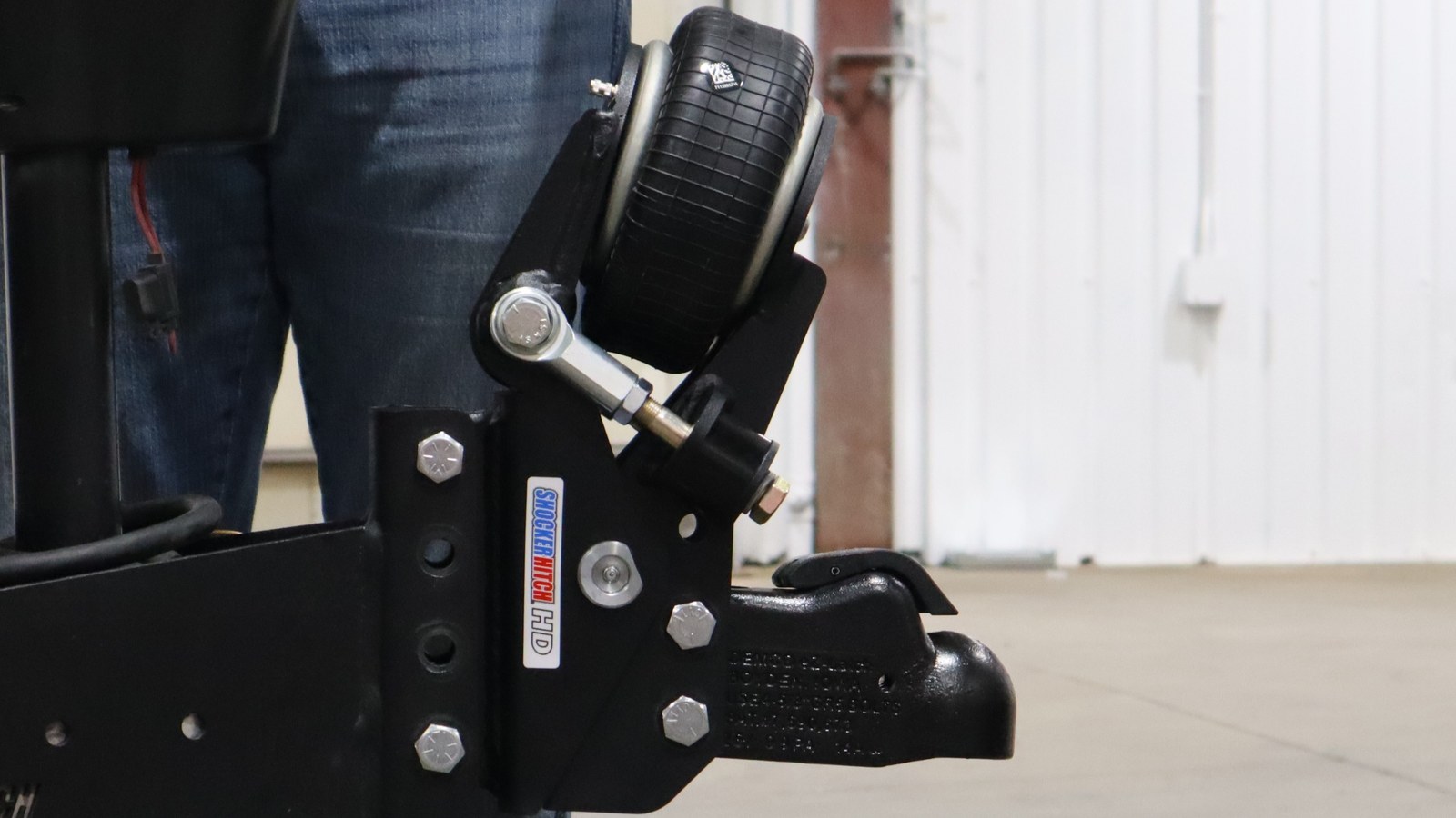 Shocker Air Tongue Mount and ball coupler positioned in the trailer vertical channel