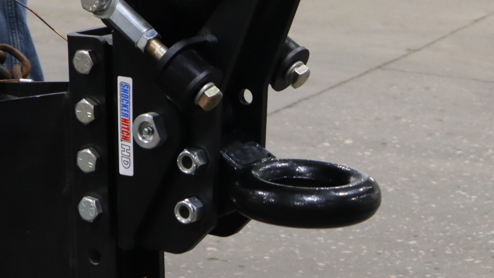 Two locknuts on the pintle-ring attachment bolts of a Shocker Air Tongue Mount